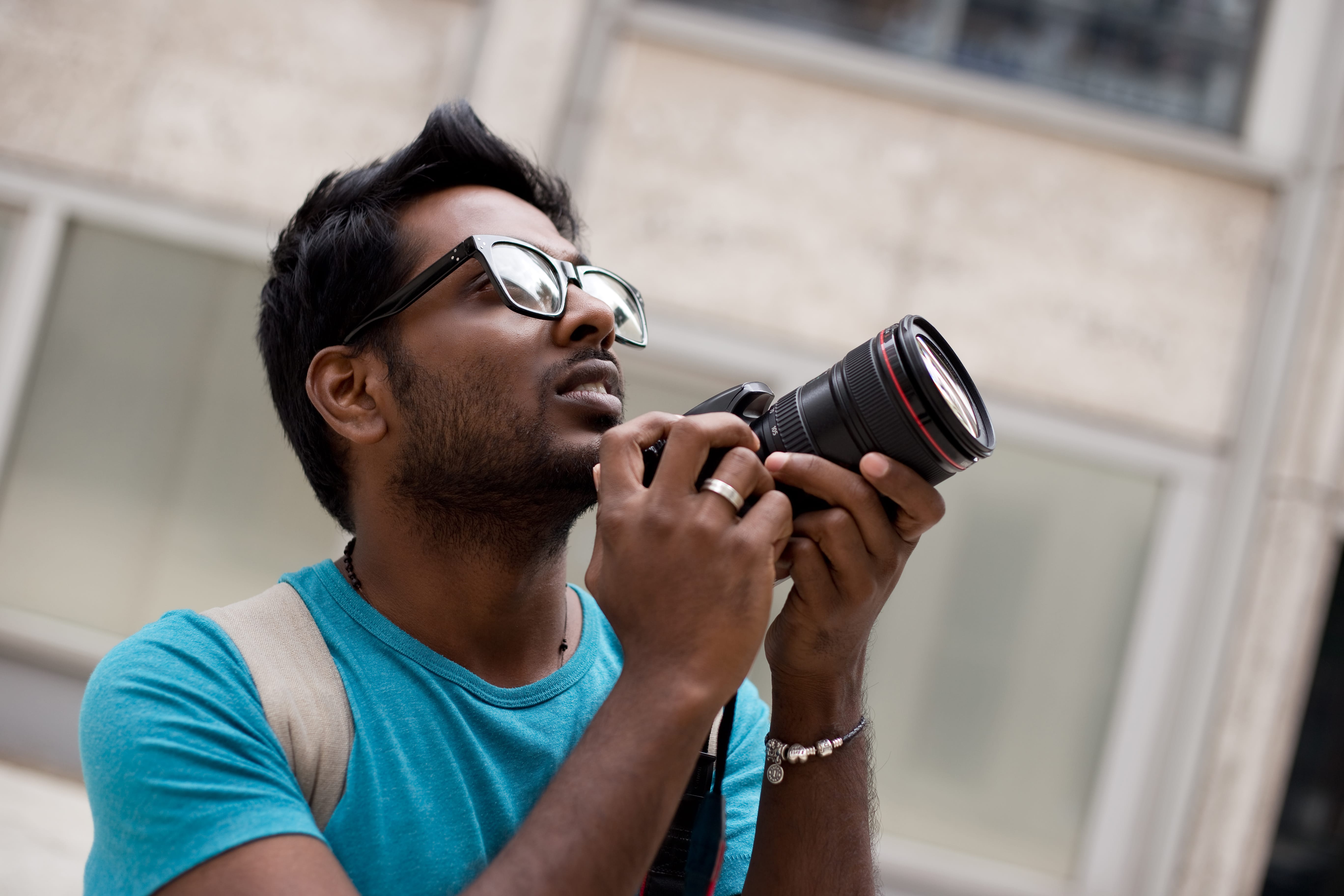 Summit Shah, traveling photographer, behind the camera on location